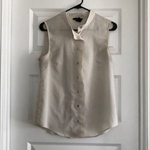 Ivory sleeveless mandarin collar blouse